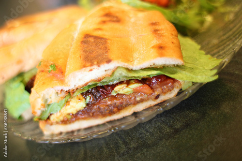 Obraz na plátně Torta Milanese or Mexican style sandwich at a local restaurant.