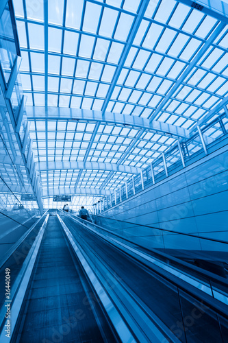 escalator in modern interior airport