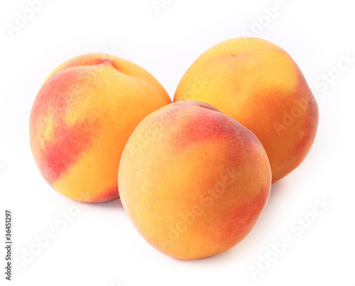 Peaches on the white background