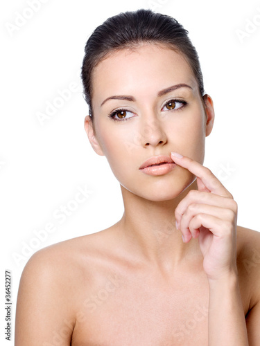 Woman touching her lips