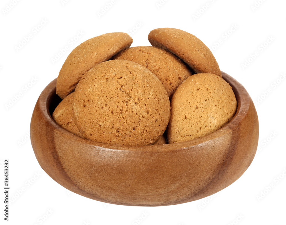 oatmeal cookies in wooden bowl on white background oatmeal cookies in wooden bowl on white background