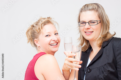 Two women celebrate success