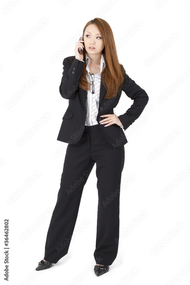 Beautiful business woman using a smart phone Beautiful business woman using a smart phone
