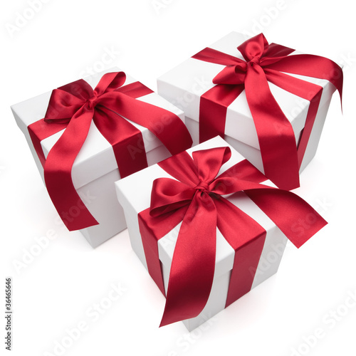 Gift boxes with red ribbons and bows.