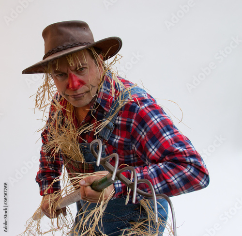 Human scarecrow scaring birds