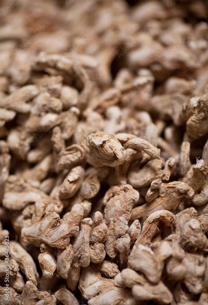 Ginger roots close-up background