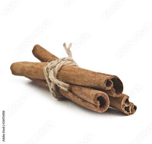 Cinnamon sticks isolated on white background photo