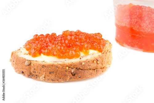 red caviar sandwich and a jar
