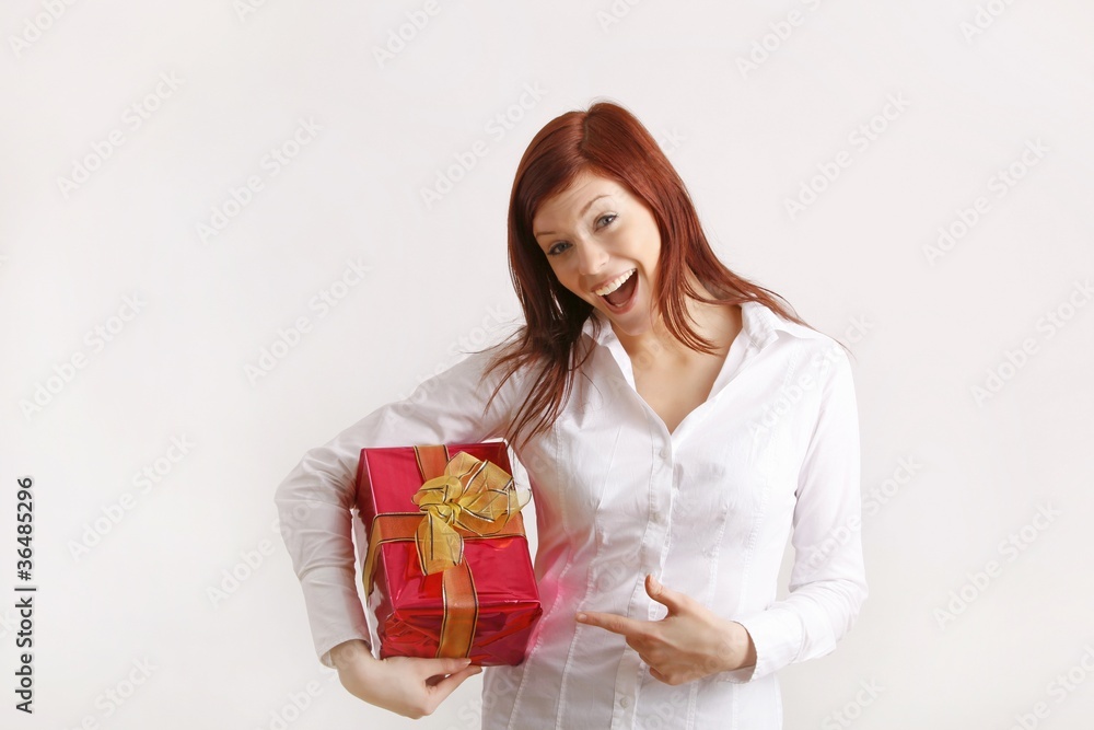 beautiful happy young woman with a red present beautiful happy young woman with a red present