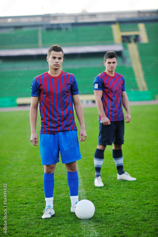 Fototapeta premium football players in competition for the ball