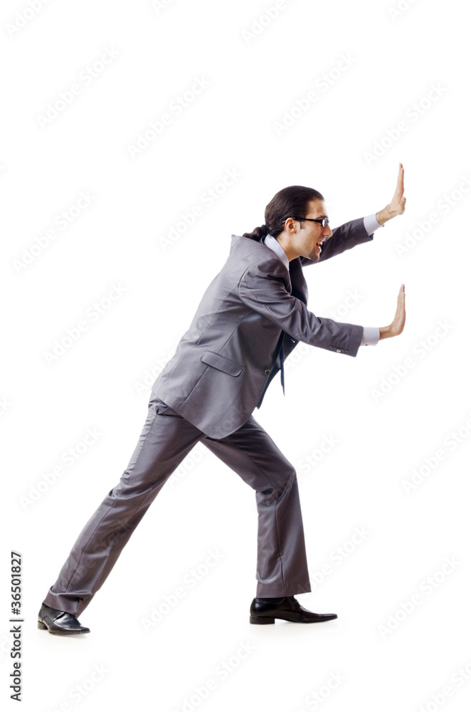 Businessman pushing away virtual problems Businessman pushing away virtual problems