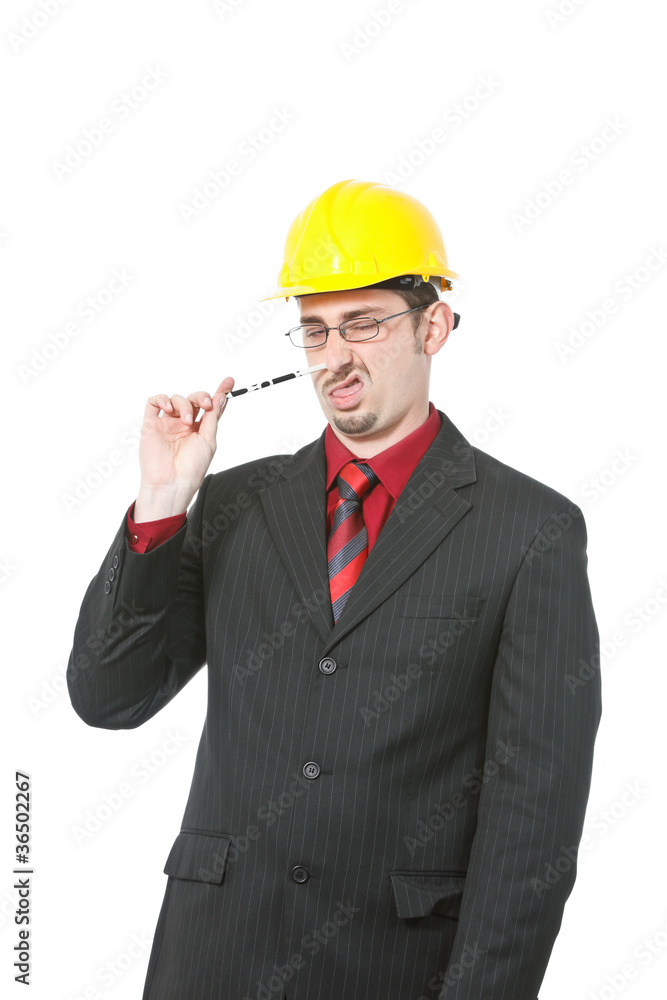Nerdy looking engineer with pen in his nose Nerdy looking engineer with pen in his nose