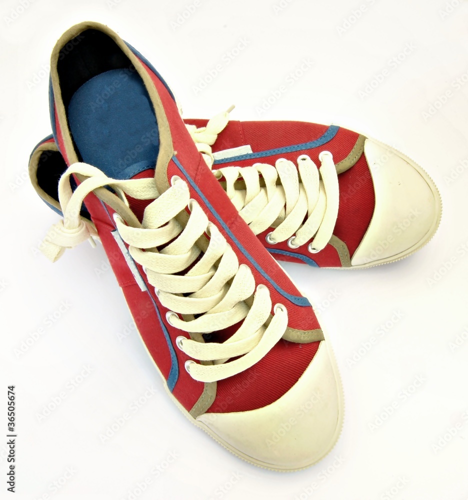 Zapatillas de lona rojas foto de Stock Adobe Stock