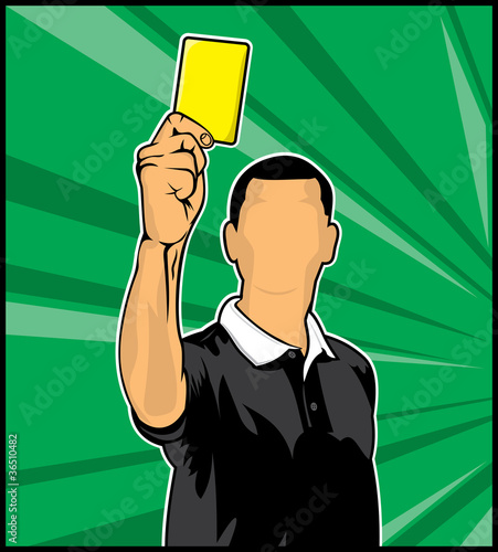Soccer referee giving yellow card