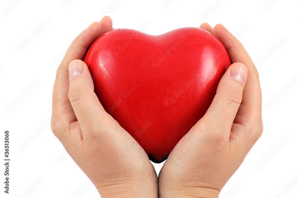 Obraz premium Czerwone serce w rękach