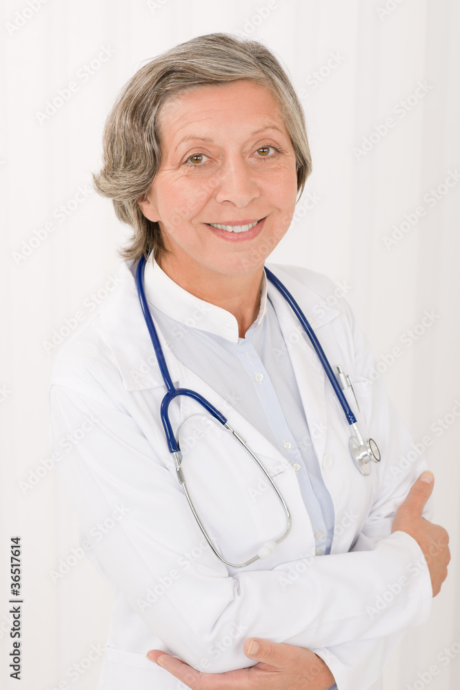 Senior doctor female with stethoscope smiling Senior doctor female with stethoscope smiling