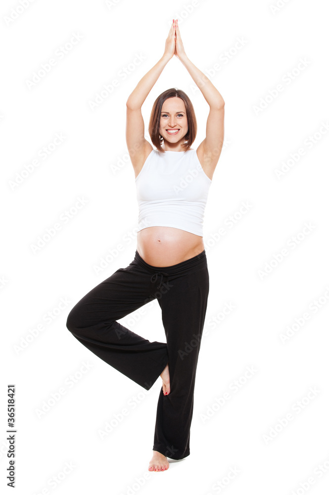 happy pregnant woman practicing yoga happy pregnant woman practicing yoga