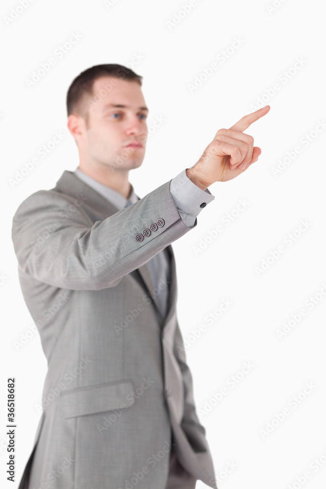 Portrait of a businessman touching something Portrait of a businessman touching something
