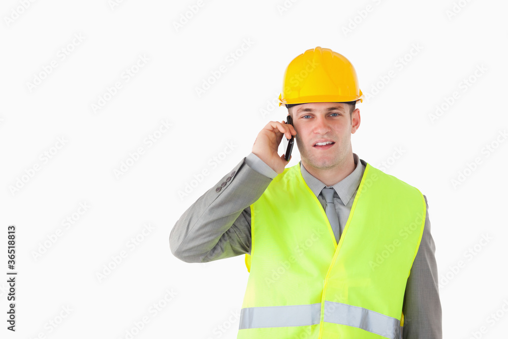 Builder making a phone call Builder making a phone call
