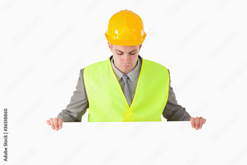 Builder looking at a blank panel Builder looking at a blank panel