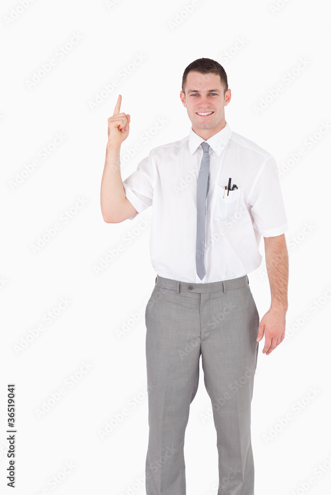 Portrait of an office worker pointing at something Portrait of an office worker pointing at something