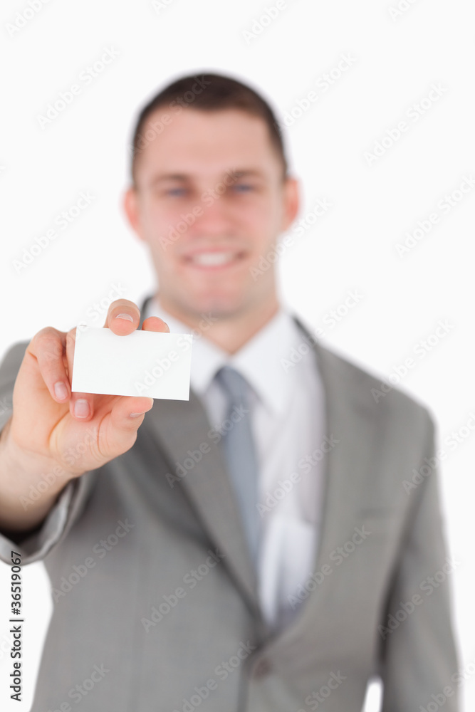 Portrait of a businessman showing a blank business card Portrait of a businessman showing a blank business card