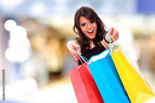 attractive young girl with shopping bags