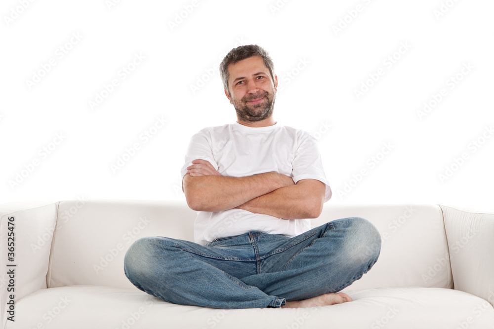 Casual man sitting on sofa