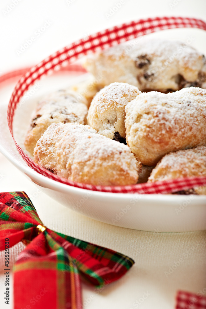 Christmas cake with icing sugar in a bowl Christmas cake with icing sugar in a bowl