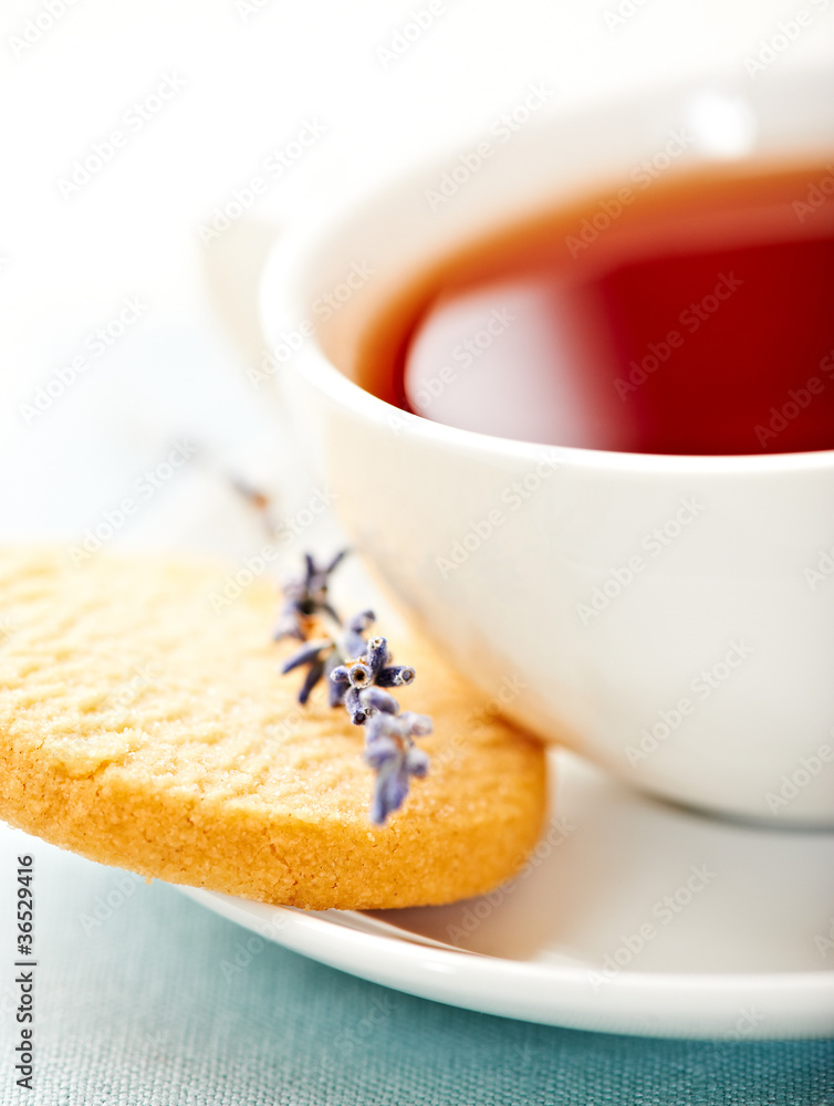 Cup of tea with biscuit and lavender Cup of tea with biscuit and lavender