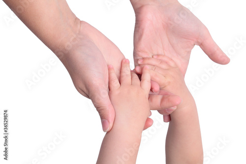 Baby holding mothers hands