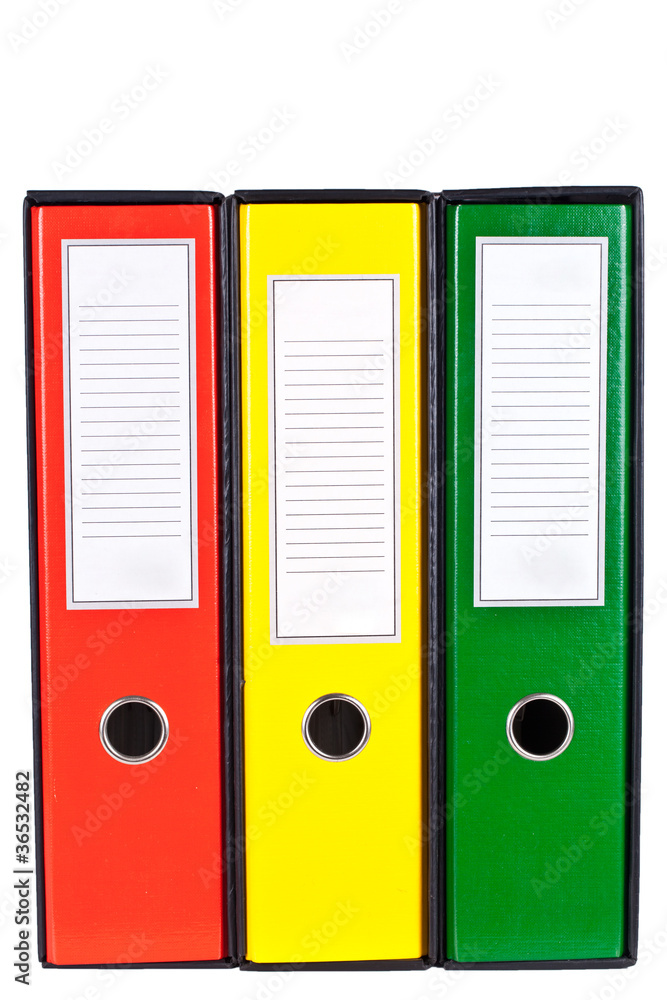 Red, green and yellow office folders with boxes isolated on whit Red, green and yellow office folders with boxes isolated on whit