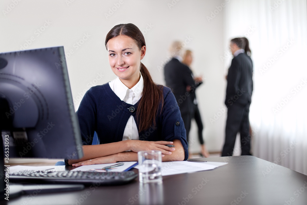 Cute young business woman smiling Cute young business woman smiling