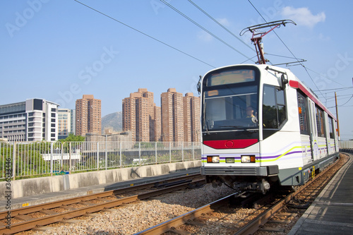 Moving train in Hong Kong at day