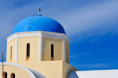 Typical Orthodox church with a blue dome in Santorini - Greece