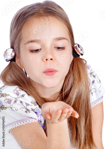 little girl sends kiss