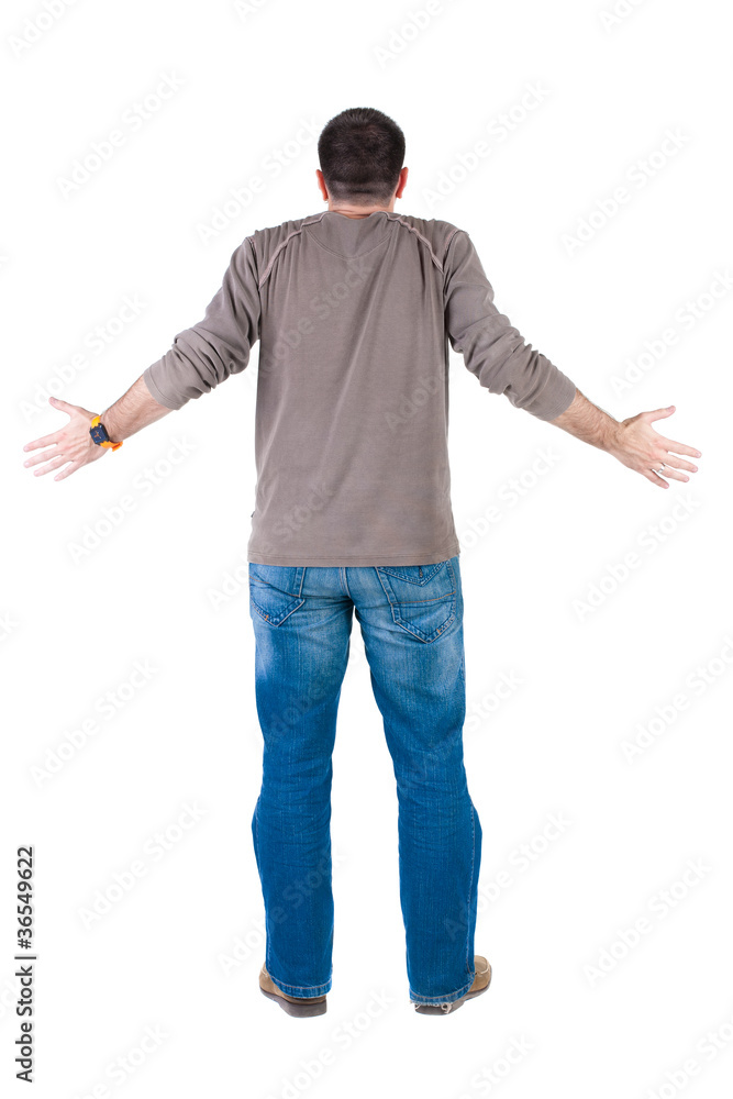 Back view of shocked and scared young man. Back view of shocked and scared young man.