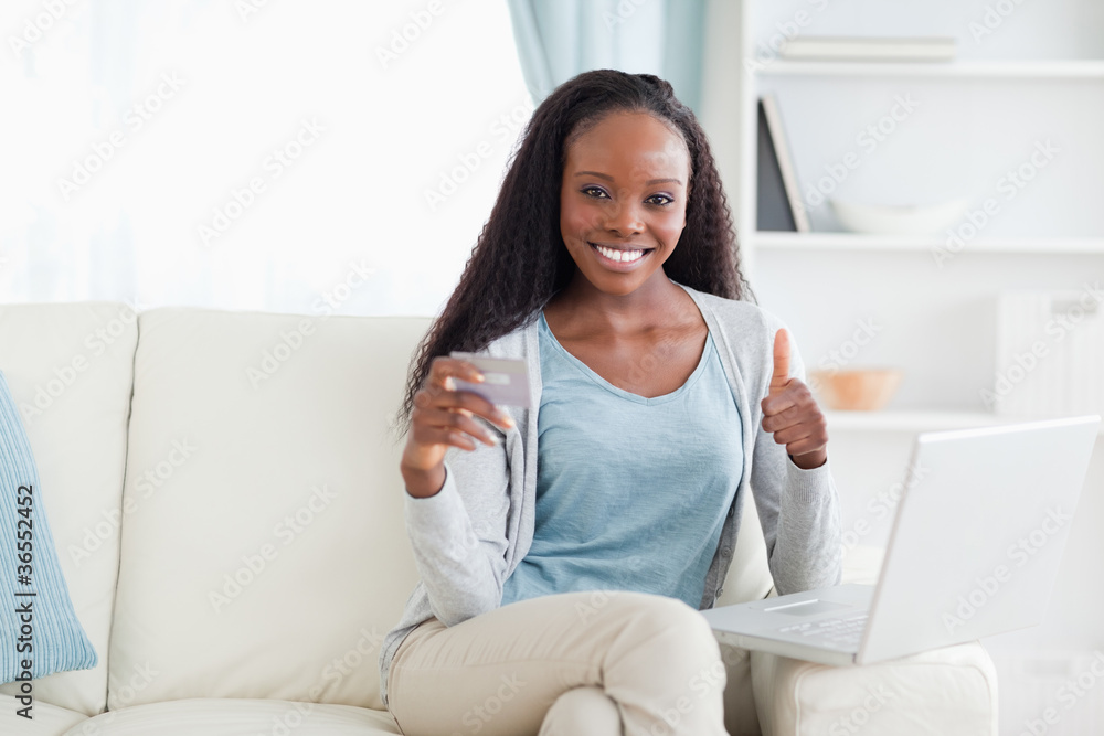 Woman happy about online shopping Woman happy about online shopping