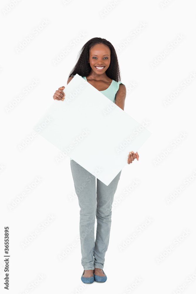 Woman holding placeholder on white background Woman holding placeholder on white background