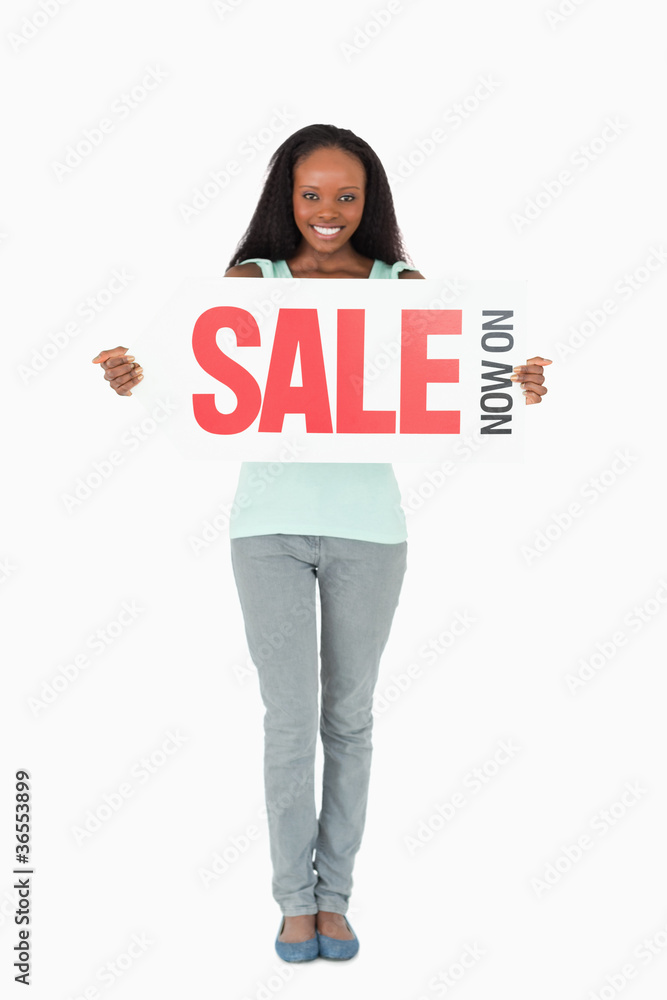 Woman holding ad on white background Woman holding ad on white background