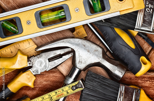 Set of manual tools over wooden boards photo