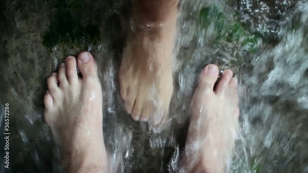Feet in the water of river Feet in the water of river
