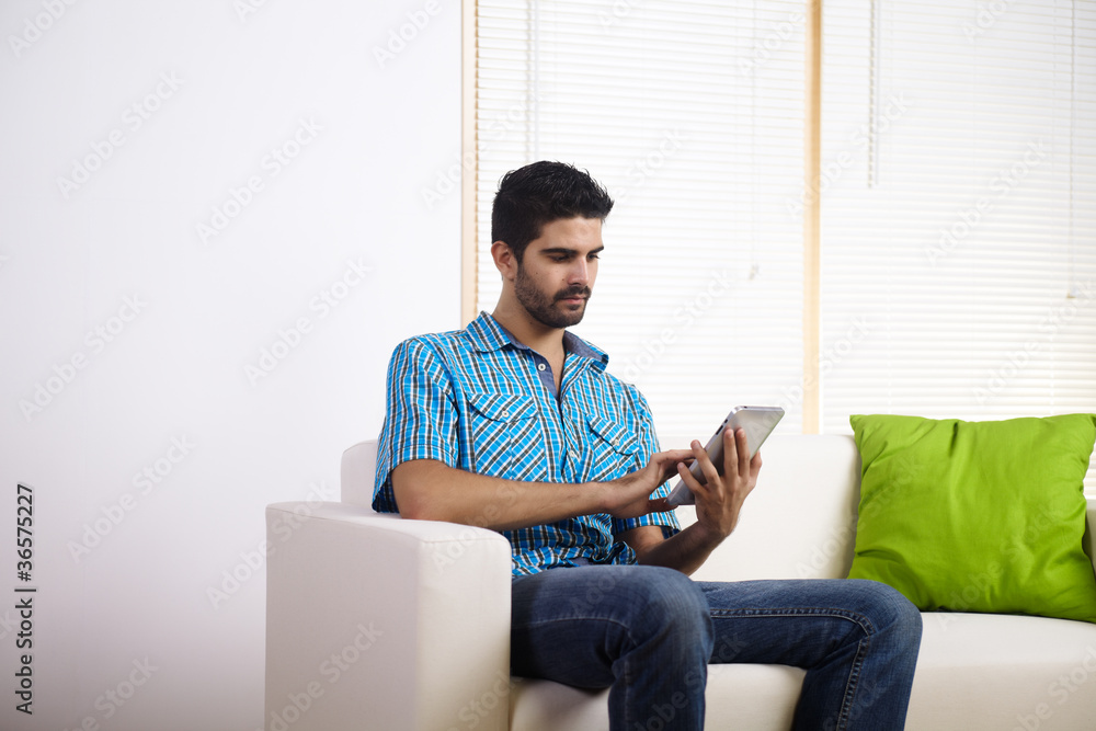 Young man using a Tablet PC