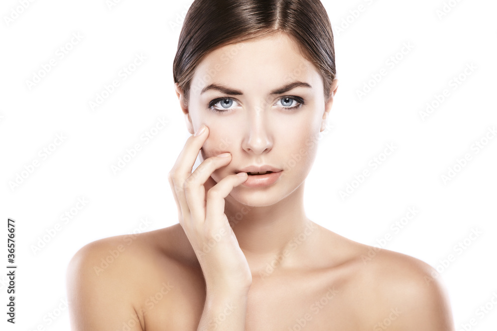 Portrait of a beautiful female model on white background Portrait of a beautiful female model on white background
