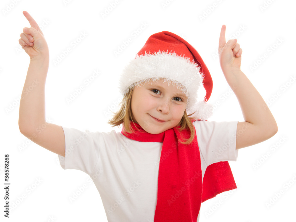 Happy Christmas child points his finger upward Happy Christmas child points his finger upward