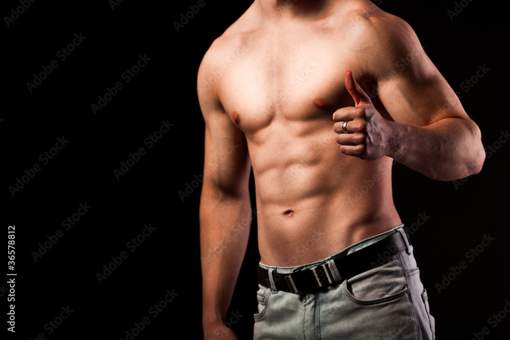 Muscular man with ok sign