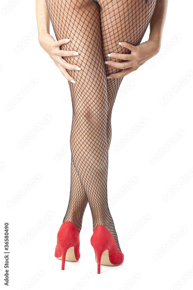 Sexyl legs in fishnet stocking Stock Photo