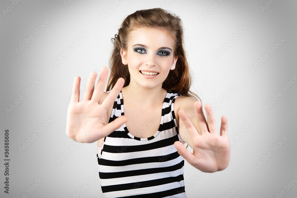 Beautiful young woman studio shot portrait. Beautiful young woman studio shot portrait.
