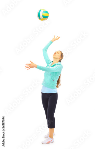 The beautiful young woman plays sports on a white
