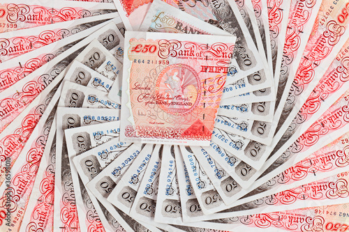 50 pound sterling bank notes closeup view business background